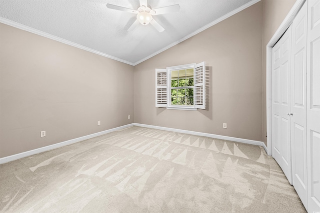 1516 Saint George Ln, Myrtle Beach, SC 29588 - unfurnished bedroom featuring a closet, baseboards, light carpet, and vaulted ceiling