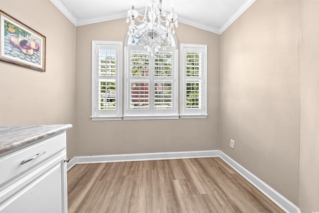 1516 Saint George Ln, Myrtle Beach, SC 29588 - unfurnished dining area with baseboards, a wealth of natural light, light wood-type flooring, and a chandelier