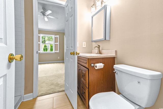 1516 Saint George Ln, Myrtle Beach, SC 29588 - bathroom featuring baseboards, a ceiling fan, a textured ceiling, and toilet