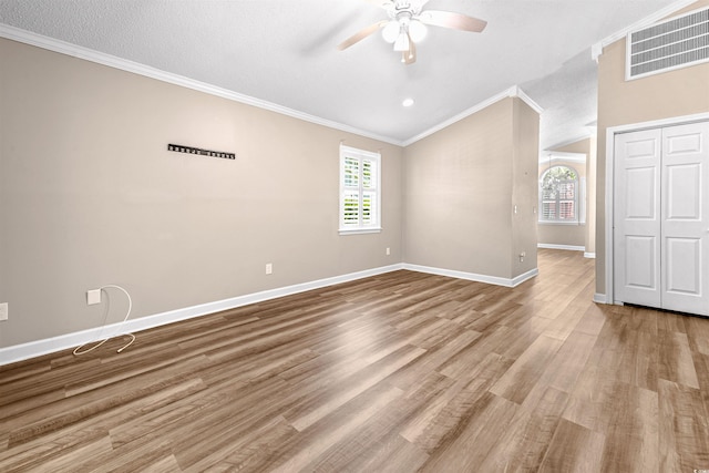 1516 Saint George Ln, Myrtle Beach, SC 29588 - interior space featuring crown molding, a ceiling fan, baseboards, wood finished floors, and visible vents