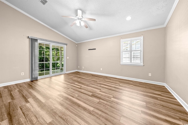 1516 Saint George Ln, Myrtle Beach, SC 29588 - empty room featuring a ceiling fan, a textured ceiling, and plenty of natural light