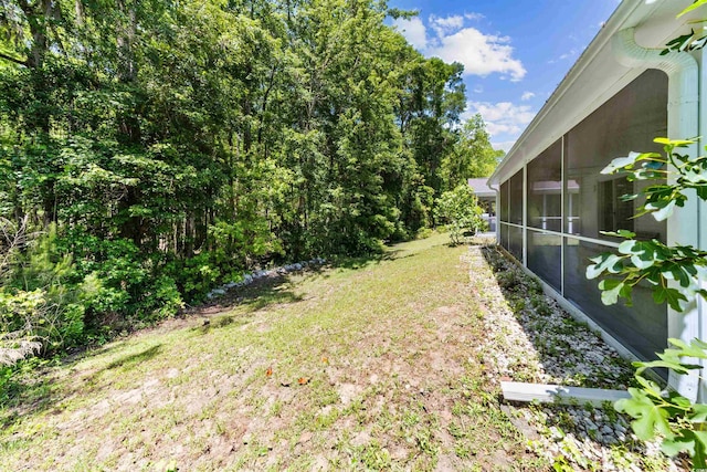 1516 Saint George Ln, Myrtle Beach, SC 29588 - view of yard featuring a sunroom