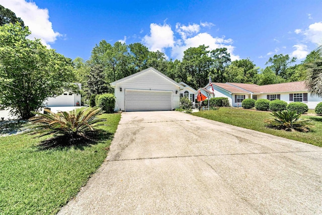 1516 Saint George Ln, Myrtle Beach, SC 29588 - ranch-style home with a garage, a front lawn, and concrete driveway