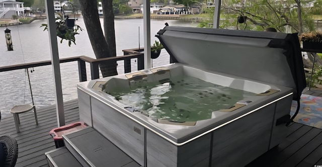 6001-Z55 S Kings Hwy, Myrtle Beach, SC 29575 - deck featuring a water view and a hot tub