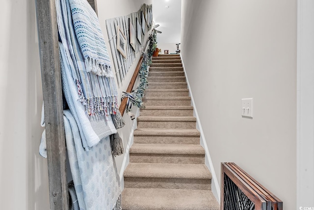 staircase with baseboards