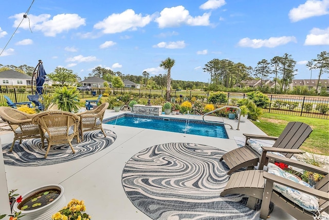 view of swimming pool featuring a fenced backyard, a fenced in pool, and a patio