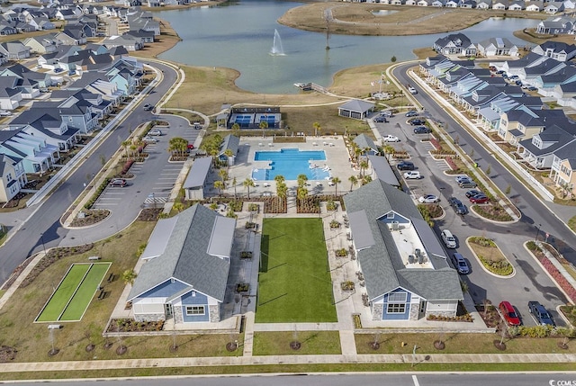 drone / aerial view featuring a water view