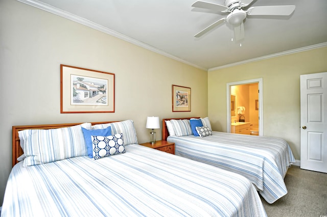 bedroom with ornamental molding, ensuite bathroom, carpet floors, and ceiling fan
