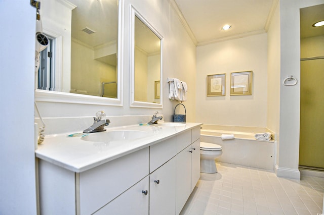 bathroom featuring ornamental molding, tile patterned floors, double vanity, a bath, and toilet