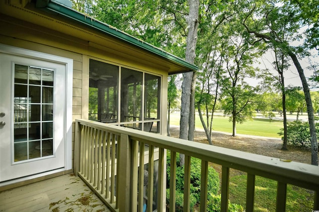 deck with a sunroom