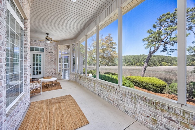 2278 Big Landing Dr, Little River, SC 29566 - unfurnished sunroom featuring a wealth of natural light and a ceiling fan