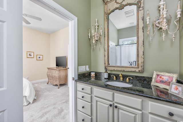 2278 Big Landing Dr, Little River, SC 29566 - bathroom with visible vents, baseboards, vanity, and ceiling fan