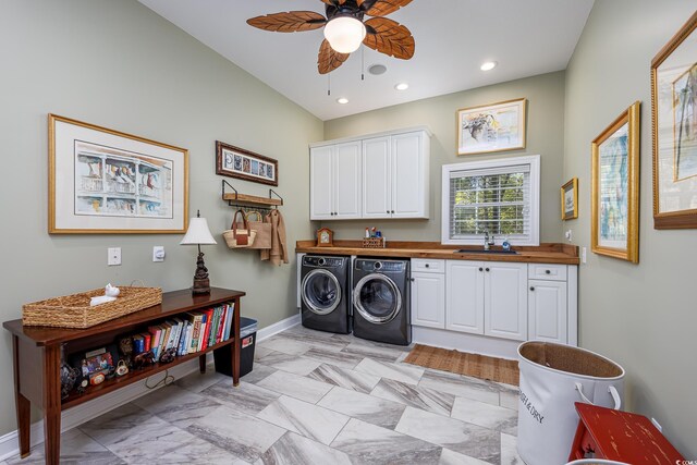 2278 Big Landing Dr, Little River, SC 29566 - laundry room featuring a sink, washer and dryer, ceiling fan, cabinet space, and baseboards