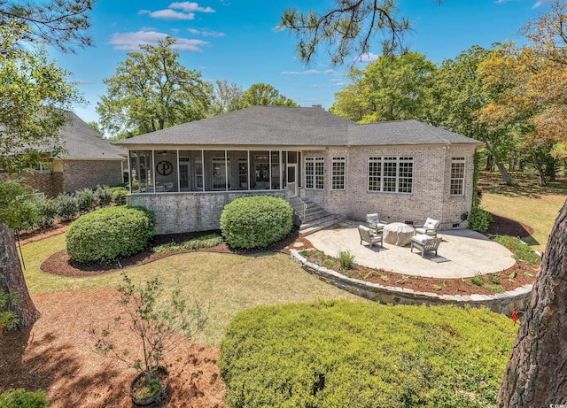 2278 Big Landing Dr, Little River, SC 29566 - rear view of house with a lawn, roof with shingles, a sunroom, and a patio area