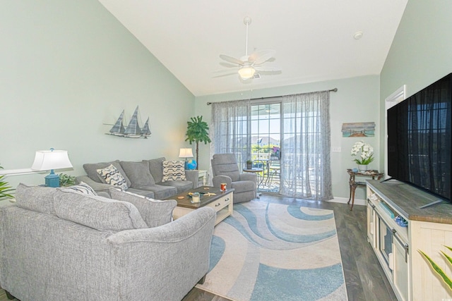living room with high vaulted ceiling, a ceiling fan, baseboards, and dark wood-style flooring