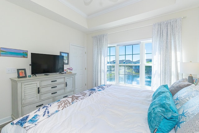 bedroom with crown molding