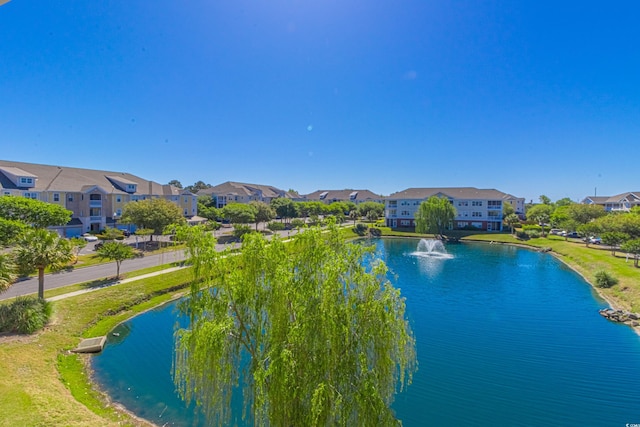 view of water feature with a residential view