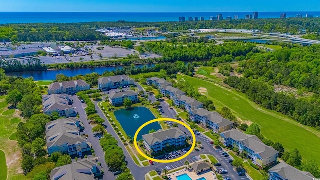 aerial view featuring a residential view and a water view