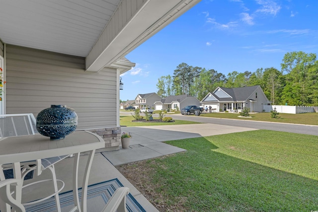view of yard with a residential view