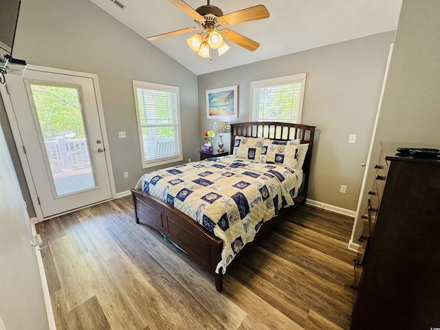 6001-1322 S Kings Hwy, Myrtle Beach, SC 29575 - bedroom with access to outside, multiple windows, wood finished floors, vaulted ceiling, and baseboards