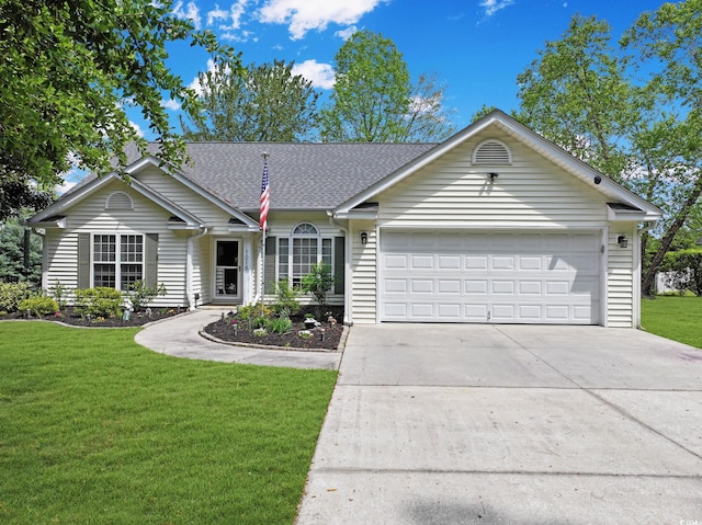 ranch-style home with concrete driveway, a front yard, a shingled roof, and a garage