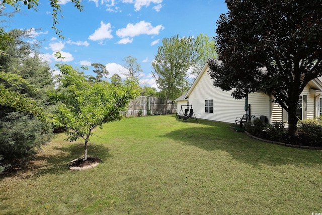 view of yard featuring fence