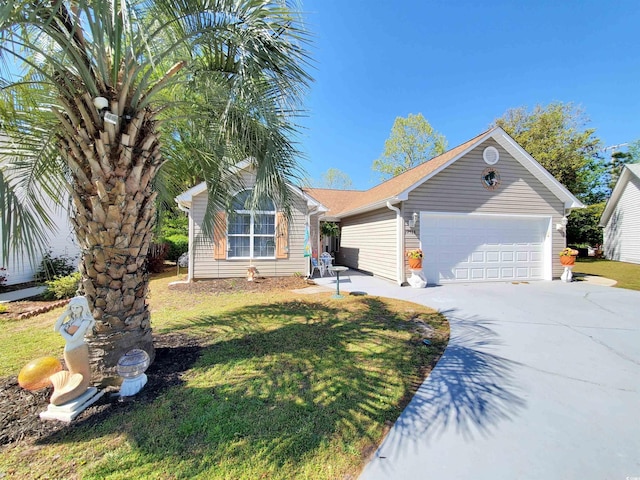 ranch-style home featuring an attached garage, driveway, and a front lawn