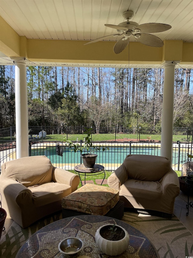 view of patio featuring a fenced in pool, an outdoor hangout area, ceiling fan, and a fenced backyard