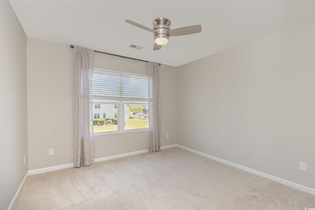 177 Olde Towne Way Unit 4, Myrtle Beach, SC 29588 - unfurnished room with baseboards, a ceiling fan, visible vents, and light colored carpet