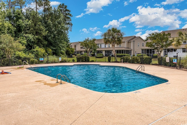 177 Olde Towne Way Unit 4, Myrtle Beach, SC 29588 - community pool featuring fence, a patio area, and a residential view