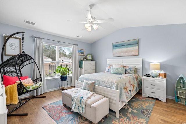 328 Logan St, Little River, SC 29566 - bedroom featuring visible vents, baseboards, vaulted ceiling, and light wood-style floors