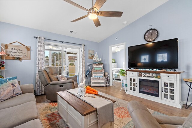 328 Logan St, Little River, SC 29566 - living room featuring visible vents, a ceiling fan, light wood finished floors, and vaulted ceiling