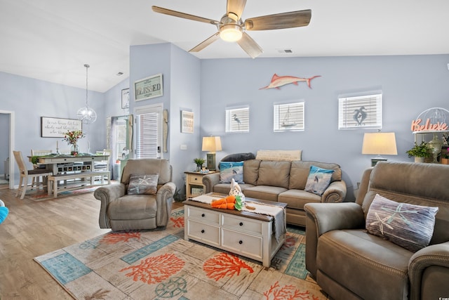 328 Logan St, Little River, SC 29566 - living area with lofted ceiling, ceiling fan, visible vents, and light wood finished floors