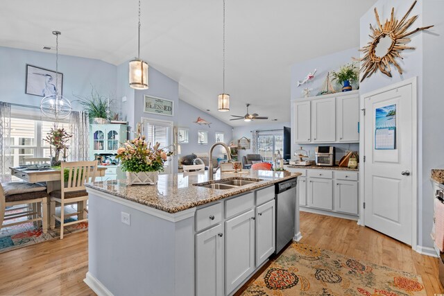 328 Logan St, Little River, SC 29566 - kitchen featuring stainless steel dishwasher, ceiling fan, light wood finished floors, a sink, and lofted ceiling