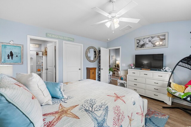 328 Logan St, Little River, SC 29566 - bedroom featuring visible vents, wood finished floors, a ceiling fan, and lofted ceiling