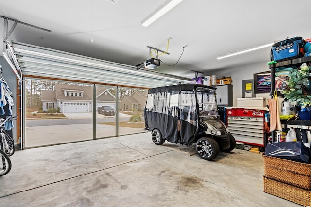 328 Logan St, Little River, SC 29566 - garage with a garage door opener