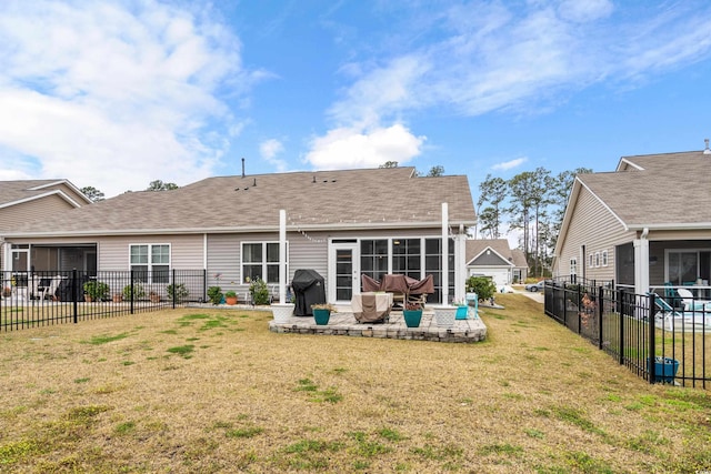 328 Logan St, Little River, SC 29566 - back of house featuring a patio, fence, a shingled roof, and a yard