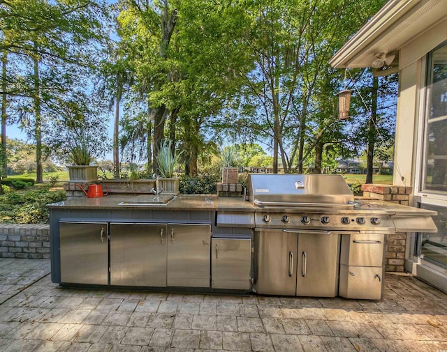 710 Masters Dr, Pawleys Island, SC 29585 - view of patio / terrace with an outdoor kitchen and a sink