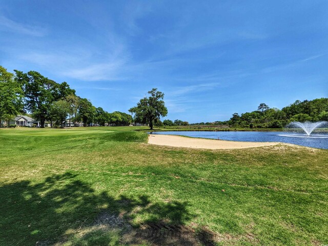 710 Masters Dr, Pawleys Island, SC 29585 - view of home's community with a yard and a water view