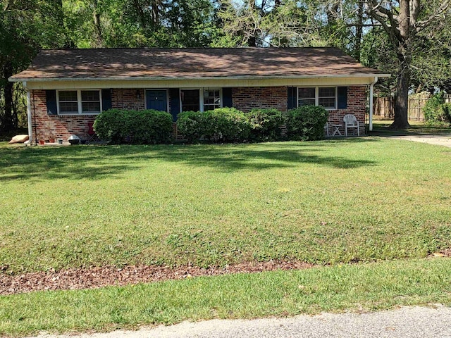 ranch-style house with brick siding