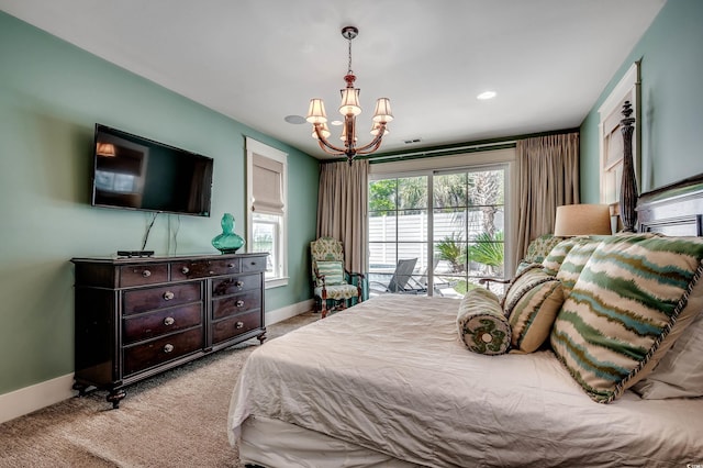 4964 Salt Creek Ct, North Myrtle Beach, SC 29582 - bedroom with a chandelier, multiple windows, and carpet floors
