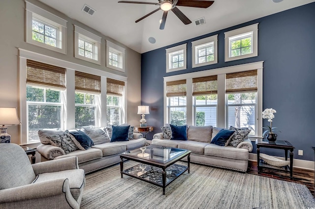 4964 Salt Creek Ct, North Myrtle Beach, SC 29582 - living area with ceiling fan, wood finished floors, and a high ceiling