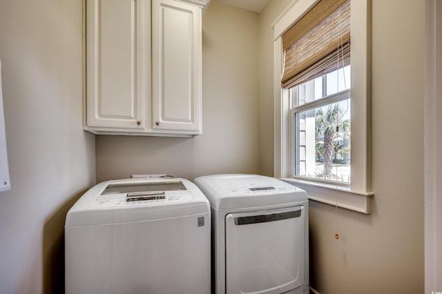 4964 Salt Creek Ct, North Myrtle Beach, SC 29582 - laundry area featuring cabinet space and separate washer and dryer