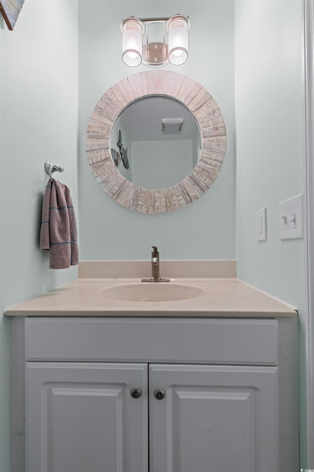 bathroom with visible vents and vanity