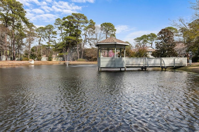 dock area featuring a gazebo and a water view