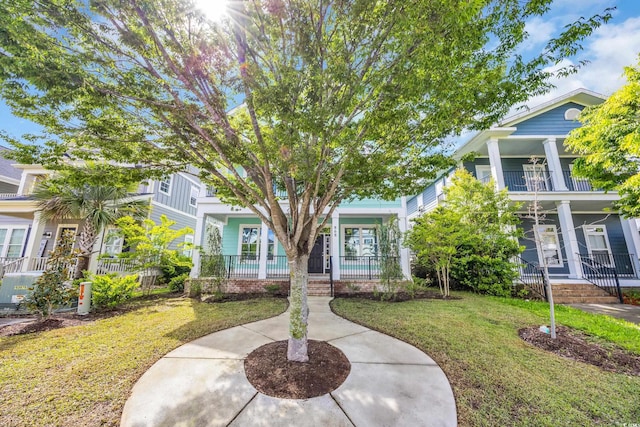 868 Crystal Water Way, Myrtle Beach, SC 29579 - view of front of house featuring a front lawn and a pool