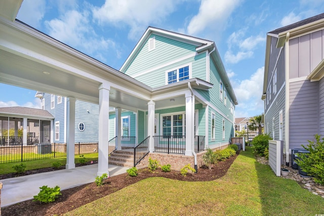 868 Crystal Water Way, Myrtle Beach, SC 29579 - view of front of property featuring covered porch and a front lawn