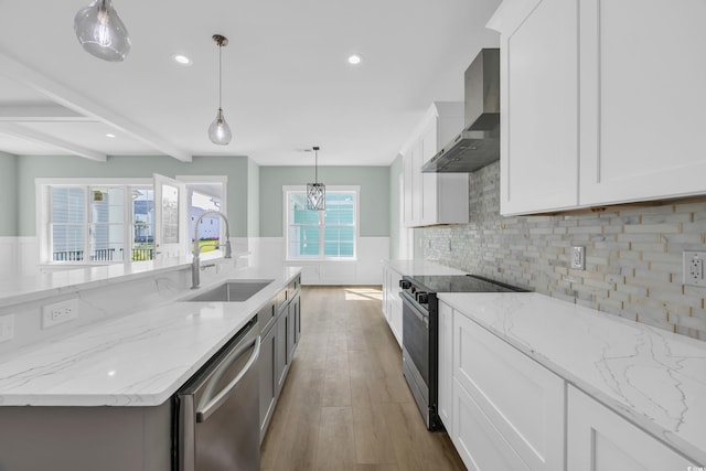 868 Crystal Water Way, Myrtle Beach, SC 29579 - kitchen featuring wall chimney range hood, electric range, stainless steel dishwasher, light wood finished floors, and white cabinetry