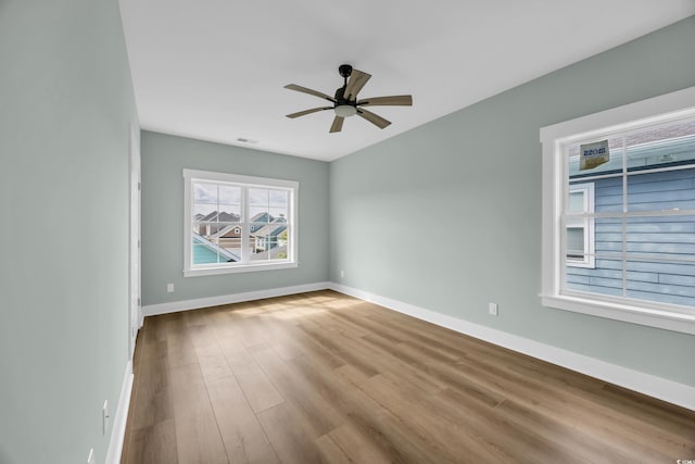 868 Crystal Water Way, Myrtle Beach, SC 29579 - unfurnished room with wood finished floors and ceiling fan