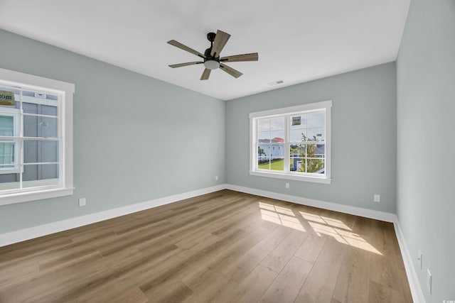 868 Crystal Water Way, Myrtle Beach, SC 29579 - empty room featuring wood finished floors and ceiling fan